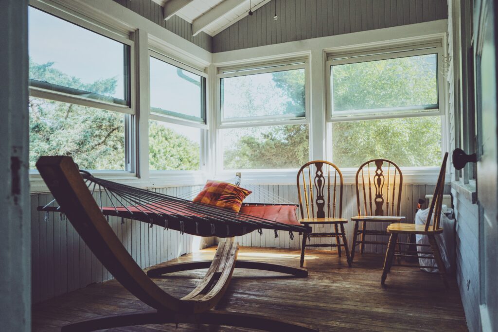 small room looks bigger with glass windows